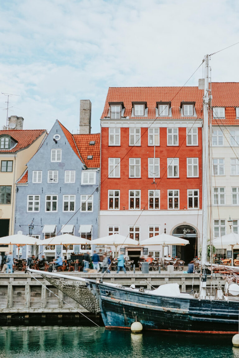 Colourful houses and boats along the Nyhavn canal in Copenhagen